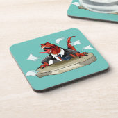 ティラノサウルスレックスボスは机に座っている。 コースター (左側)