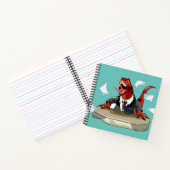 ティラノサウルスレックスボスは机に座っている。 ノートブック (内部)