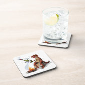 ティラノサウルスレックス料理のキャンプファイヤーの上の食べ物。 コースター (右側)