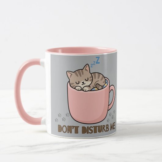 ティーカップで眠るかわいい子猫のマグカップ マグカップ (左)