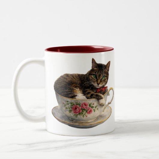 ティーカップの中のトラ猫 ツートーンマグカップ (左)