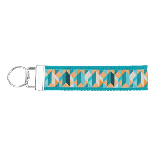 ティール（緑がかった色）およびオレンジ形パターン リストバンドキーホルダー (鍵左)