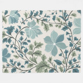 ティール（緑がかった色）とクリームの背景に緑の花のパターン フリースブランケット (正面(横))