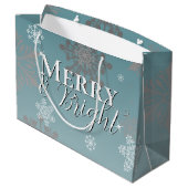 ティール（緑がかった色）と明メリーるい雪の結晶クリスマス ラージペーパーバッグ (裏面アングル)