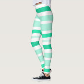 ティール(緑がかった色)と白のストライプのレギンス レギンス (左)