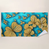 ティール（緑がかった色）と金ゴールドの花パーソナライズされた名 ビーチタオル (正面)