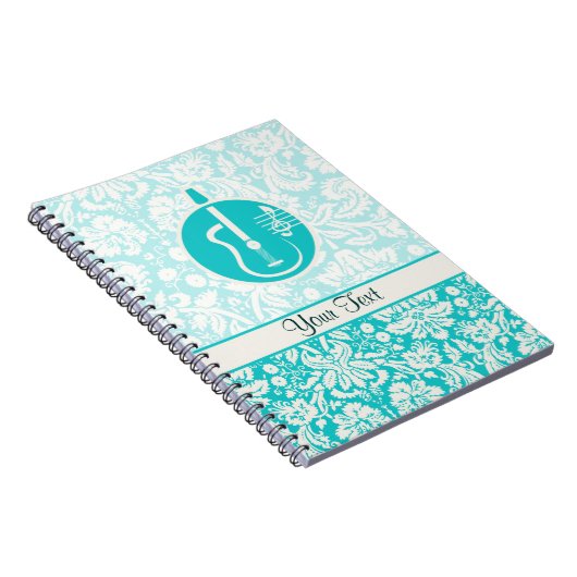 ティール(緑がかった色)のアコースティックギター ノートブック (右側)