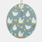 ティール(緑がかった色)のクープで夢を見る鶏 セラミックオーナメント (左)