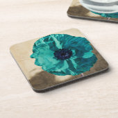 ティール（緑がかった色）のケシのコースターセット コースター (左側)