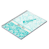 ティール(緑がかった色)のバイオリン ノートブック (左側)