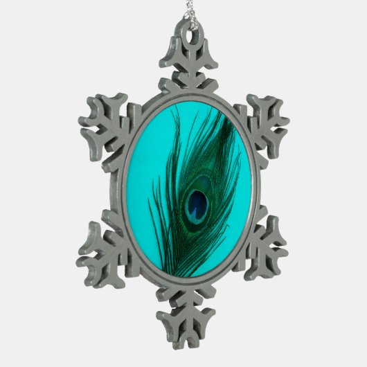 ティール(緑がかった色)の孔雀の羽 スノーフレークピューターオーナメント (左)