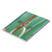 ティール(緑がかった色)の目のトンボにカタチが入る ノートパッド (回転)