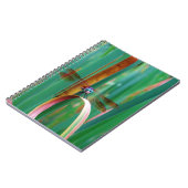 ティール(緑がかった色)の目のトンボにカタチが入る ノートブック (左側)