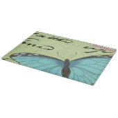 ティール(緑がかった色)の郵便はがきの青飛んだ蝶 カッティングボード (角)