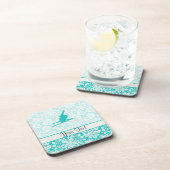 ティール(緑がかった色)の雪のスキー コースター (右側)