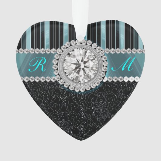 ティール（緑がかった色）の、銀製および黒ダイヤのモノグラム オーナメント (正面)
