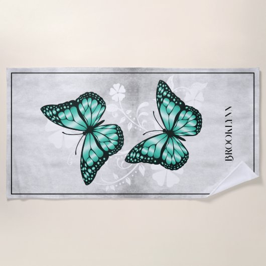ティール(緑がかった色)バタフライフローラビーチタオル ビーチタオル (正面)