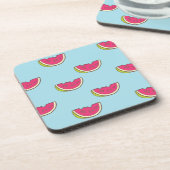 ティール(緑がかった色)パターンのスイカの切れ コースター (左側)