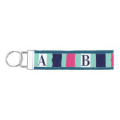 ティール（緑がかった色）ピンクとブルーのストライプモノグラム リストバンドキーホルダー (鍵左)