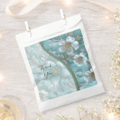 ティール（緑がかった色）ホワイトフローラ優先バッグ フェイバーバッグ (クリップ留めされた状態)