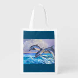 ティール（緑がかった色）色の水に遊浮かぶイルカの芸術 エコバッグ