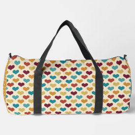 ティール（緑がかった色）赤オレンジ色の黄色い模様 ダッフルバッグ