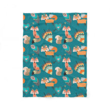 ティール（緑がかった色）部族キツネパターン