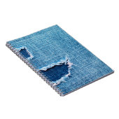 テクスチャのデニムの背景。布の破れた穴 ノートブック (右側)