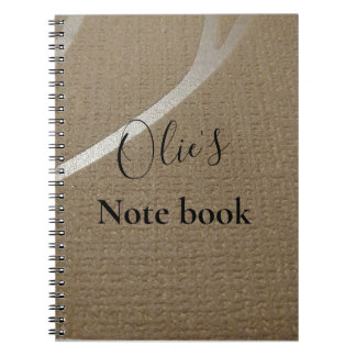 テクスチャ付きの茶色のスパイラルノートブック。 ノートブック