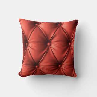 テクスチャ付きレッドレザー：詳細なマテリアルのクローズアップ クッション
