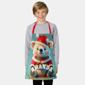 テディベアのクリスマスパーソナライズされたキッズ エプロン (着用した状態)