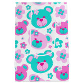 テディー・ベアおよび花は水の白のギフトバッグを飾ります ミディアムペーパーバッグ (裏面)