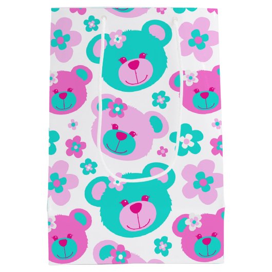 テディー・ベアおよび花は水の白のギフトバッグを飾ります ミディアムペーパーバッグ (裏面)