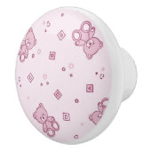 テディー・ベアの背景のピンク セラミックノブ (右)