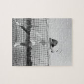 テニスを遊んでいる女性 ジグソーパズル (横)