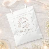 テラコッタモダンリーフィクレストモノグラム結婚ズ フェイバーバッグ (クリップ留めされた状態)