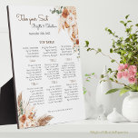 テラコッタ結婚フローラの座席表 フォトプラーク<br><div class="desc">このボー素晴らしホフェザーとユニークフローラテーブルのシートチャートのテーブルトップのプラークで結婚式のレセプションのためのディスプレイを作成する。ボヘミアの花、茶色のススキ、秋の要素の美しいデザインと、あなたの名前、結婚式の日付、テーブルの割り当てを特徴とする。テーブ来ルや他の任意の場所で簡単表示用のイーゼルが付いている。このプラークは、あなたの特別な日に座って、いくつかのbohoの魅力を追加するゲストを示すのに最適な方法である。</div>