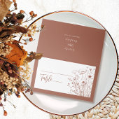 テラコッタ背景白ワイルドフラワーモノグラム プレイスカード