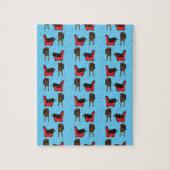 テレビ漫画の前で眠るブラックバード ジグソーパズル (縦)