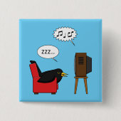 テレビ漫画の前で眠るブラックバード 缶バッジ (正面)