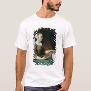 テーブルで着席する女の子のポートレート Tシャツ