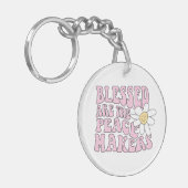 デイジーと平和を作る人のスローガン キーホルダー (正面左)