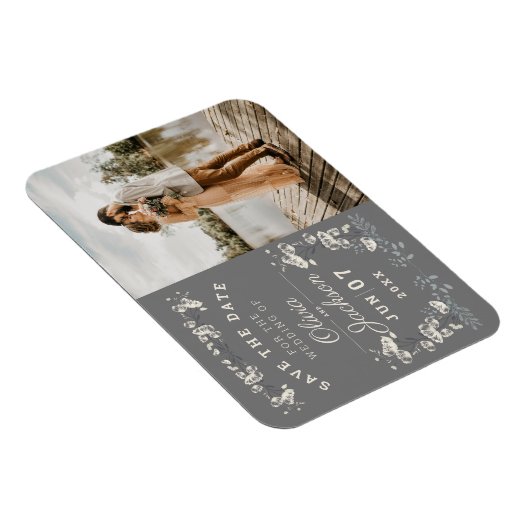 デエレガントータを保存するほこりの多い灰色と白のフローラ マグネット (右側)