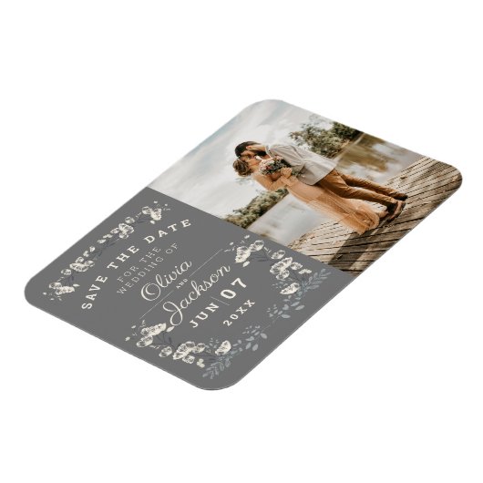 デエレガントータを保存するほこりの多い灰色と白のフローラ マグネット (左側)