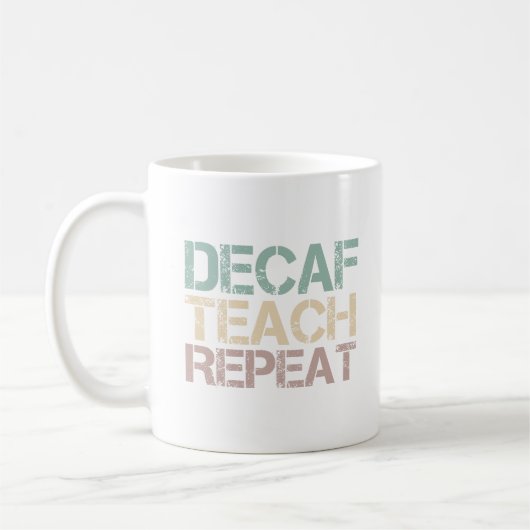 デカフェコーヒー 教える 反復 楽しい先生の引用 コーヒーマグカップ (左)