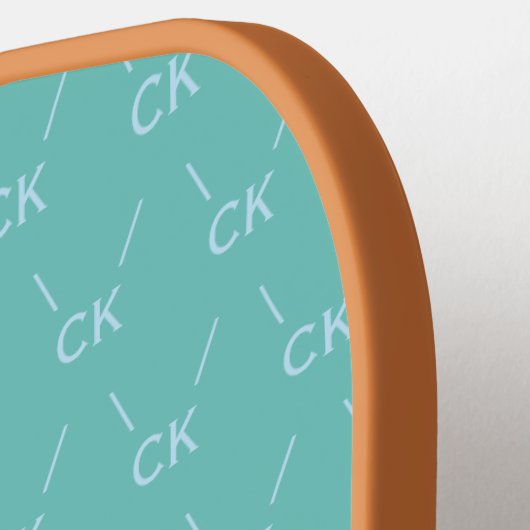 デザイモダンナのパターストライプン青を使用したモノグラム ピックルボールラケット (左詳細)