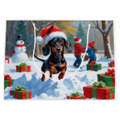 デシュント走の雪とクリスマスハット ラージペーパーバッグ (正面)