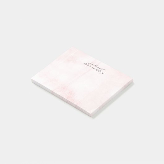 デスクからピンクの水彩のテクスチャ ポストイット (アングル)