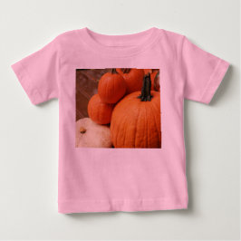 デッキのハロウィーン用のカボチャ ベビーTシャツ