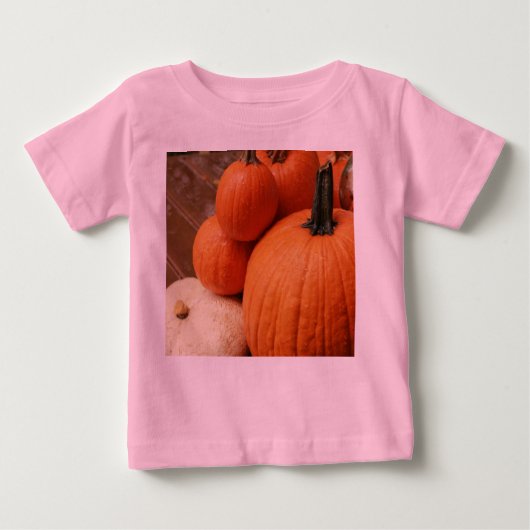 デッキのハロウィーン用のカボチャ ベビーTシャツ (正面)
